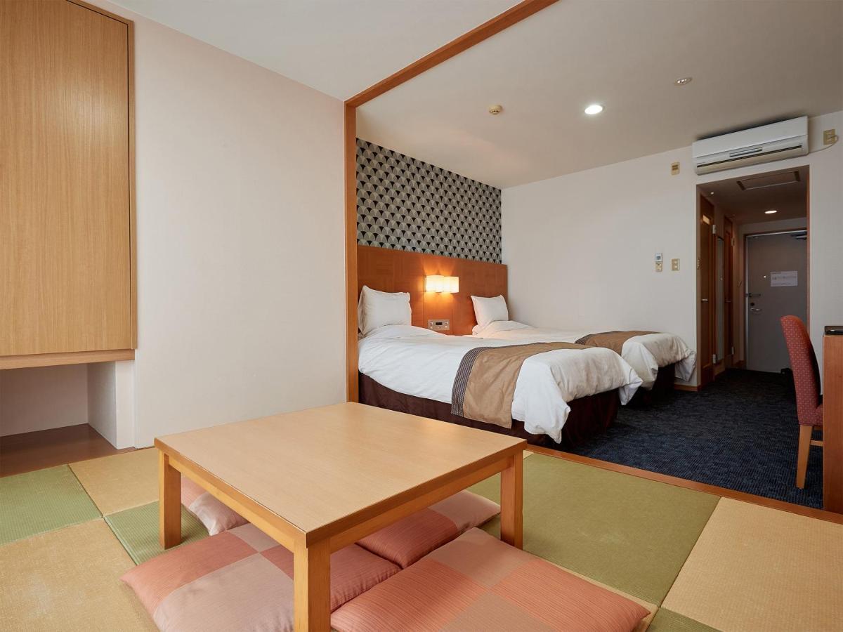 Hotel Murasakimura Yomitan Exterior foto
